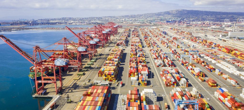 an aerial view of a port with a large amount of containers