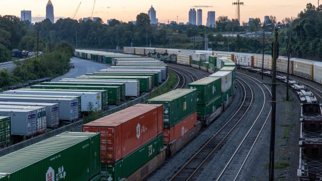 01dc-railstrike-explainer-1-cf3b-videoSixteenByNine3000 a train yard filled with lots of train cars